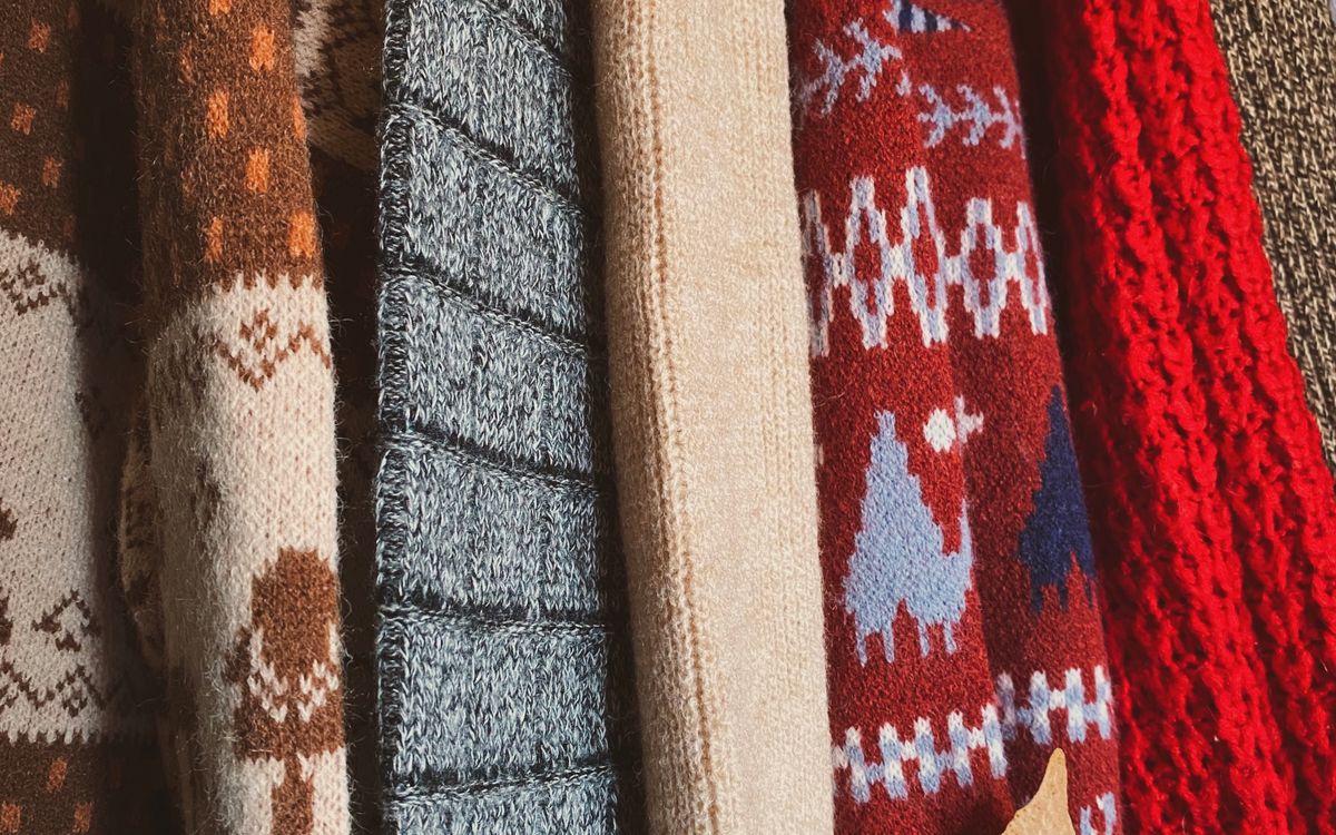 A choice of sweaters on a rack